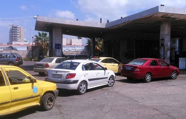 Cars line up at a gas station in Syria, where the public has grappled with fuel scarcity and high fuel prices. [SANA News Agency]