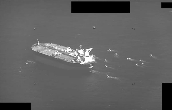 A screenshot from a video shows fast-attack craft from Iran's IRGC Navy swarming Panama-flagged oil tanker Niovi as it transits the Strait of Hormuz on May 3. [US Navy]