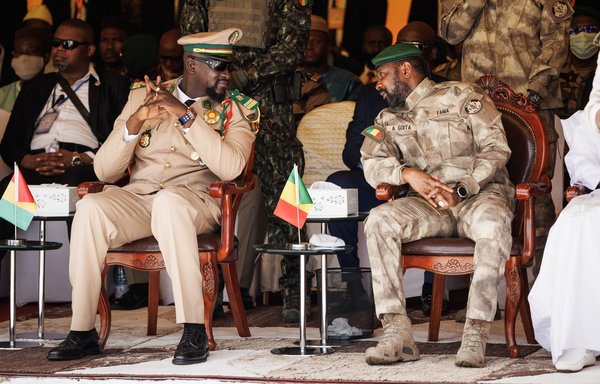 Mali's interim leader and head of junta, Col. Assimi Goïta (R), is seen with Guinean interim leader and head of junta Mamady Doumbouya in Bamako, Mali, on September 22. Goïta's chief of staff was killed in a terrorist attack April 18 claimed by Jama'at Nusrat al-Islam wal-Muslimin (JNIM), al-Qaeda's affiliate in Mali. [Ousmane Makaveli/AFP]