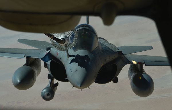 A French air force Dassault Rafale receives fuel from a US Air Force KC-10 Extender assigned to the 908th Expeditionary Air Refueling Squadron out of al-Dhafra air base in the UAE on August 28, 2019. [US Air Force]