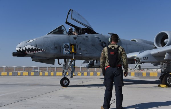 A US airman prepares an A-10 Thunderbolt II at the Al Dhafra Air Base, UAE, on April 6. [US Air Force]