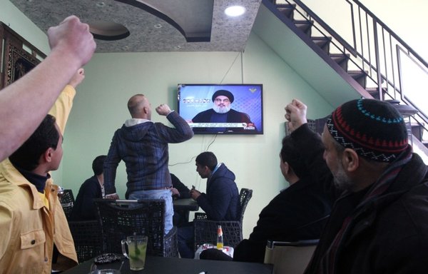 Hizbullah chief Hassan Nasrallah gives a televised speech from an undisclosed location in Lebanon on Hizbullah's Al-Manar TV on January 30, 2015. [Hazem Bader/AFP]