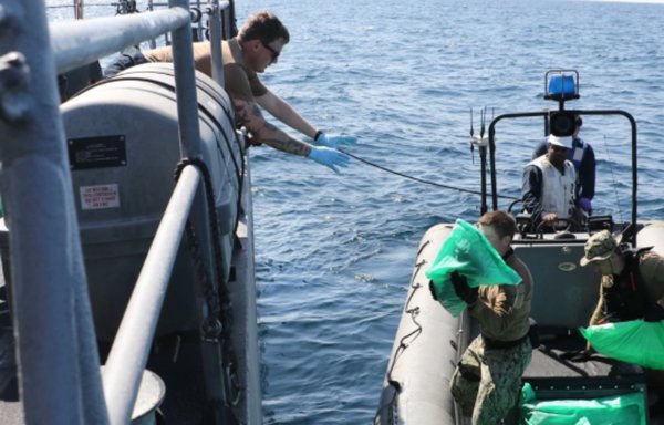 US naval forces seize 2,116 AK-47 assault rifles from a fishing vessel transiting a maritime route from Iran to Yemen on January 6. [US Navy]