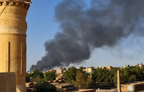 Smoke rises above buildings in Khartoum, as violence between two rival Sudanese generals continues, on May 17. [AFP]