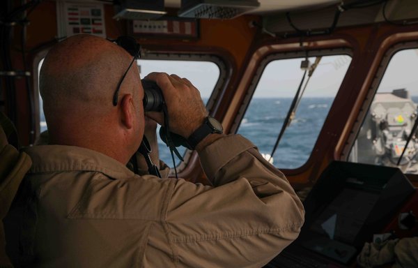 US Coast Guard ships patrol the Strait of Hormuz on May 17. The US 5th Fleet has increased the rotational presence of forces in the key maritime strait after Iran seized three vessels in three weeks. [USCG]