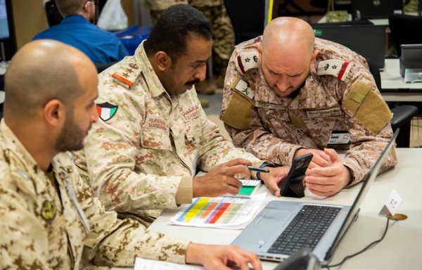 Senior staff officers from Bahrain, Kuwait and Saudi Arabia, conduct a scenario-driven intelligence analysis to identify potential threats to their countries' airspace during Eagle Resolve 22 that was held at Fort Carson, Colorado, March 12, 2022. [US Army]