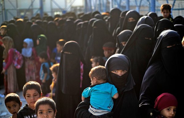 A picture shows the Kurdish-run al-Hol camp, which holds relatives of suspected ISIS fighters in northeastern Syria, during a security operation by the Kurdish Asayish security forces and the Syrian Democratic Forces, on August 26. [Delil Souleiman/AFP]