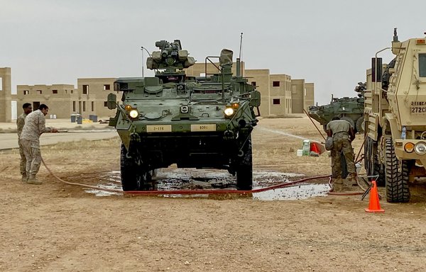 US and Saudi troops simulate decontamination of a US Army M1135 CBRN Reconnaissance Vehicle for the Chemical, Biological, Radiological and Nuclear (CBRN) training portion of Eagle Resolve 23 on May 29. [US Army]