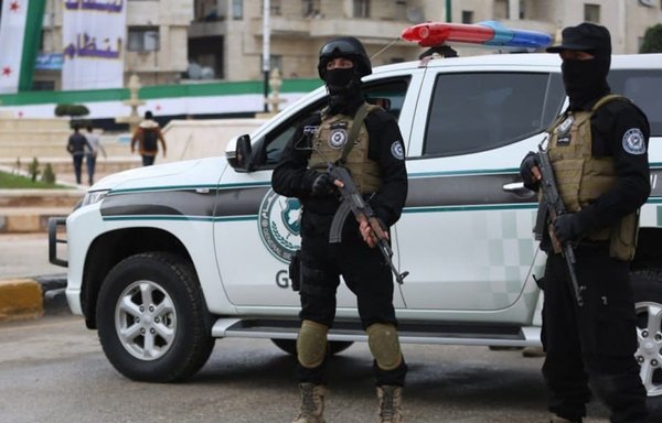 Tahrir al-Sham elements are seen here on March 18 at the extremist alliance's headquarters in the Syrian city of Idlib. [Tahrir al-Sham's General Security Service Facebook page]