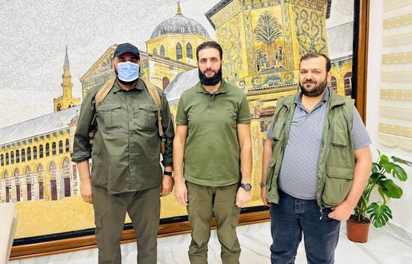 Tahrir al-Sham senior official Abu Maria al-Qahtani (L), the group's leader Abu Mohammed al-Jolani (C) and Tahrir al-Sham official Abu Ahmad Zakour are seen here in a photo posted on Twitter on October 16 by French journalist Wassim Nasr, shortly after a visit to an area controlled by Tahrir al-Sham. [Wassim Nasr/Twitter]