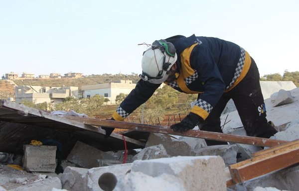 A member of the White Helmets searches the rubble of the house in which ISIS leader Abu Ibrahim al-Hashemi al-Qurashi was killed in the Syrian town of Atmeh on February 2, 2022. [White Helmets]