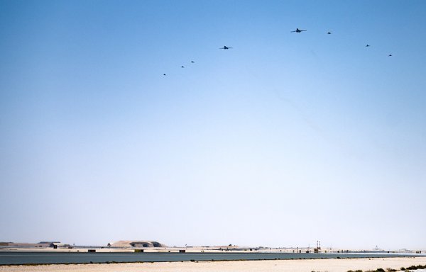 B1-B Lancers are escorted by coalition fighters over al-Udeid air base in Qatar during a Bomber Task Force mission on June 8. [CENTCOM]