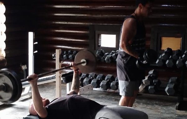 The Karyet al-Ensen centre's sports club enables recovering drug addicts to engage in sports, including weightlifting, under the supervision of trainers. [Karyet el-Ensen/Father Majdi Allawi]