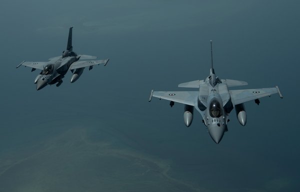 Two United Arab Emirates Air Force F-16 Falcons fly in formation in 2019. [CENTCOM]
