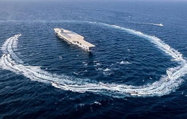 Experts lampoon IRGC demand for ships to use Persian in Hormuz Strait