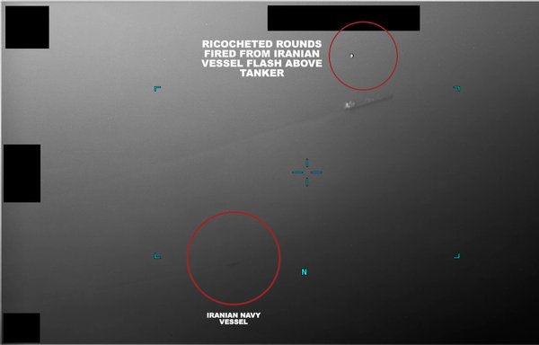 A video screenshot showing an Iranian naval vessel firing multiple, long bursts of rounds from small arms and crew-served weapons at a commercial tanker in the Gulf of Oman on July 5. [Courtesy photo/NAVCENT]