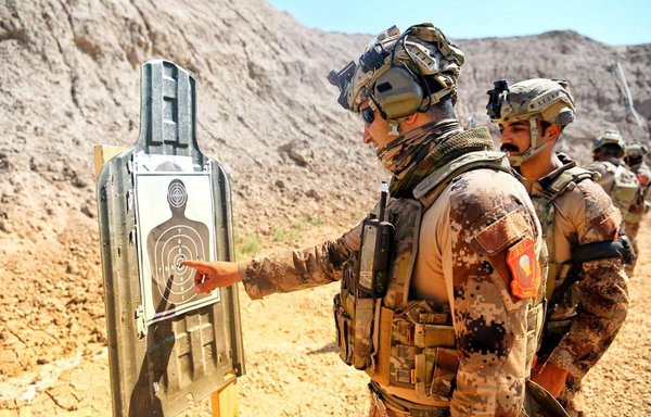 Members of Iraq's Counter-Terrorism Service take part in a firing exercise on July 3. [Counter-Terrorism Service Facebook page]