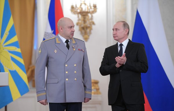 In this picture taken on December 28, 2017, Putin presents an award to then Colonel General Sergei Surovikin, the commander of Russian troops in Syria. Surovikin, now a full general, has not been seen in public since the Wagner uprising. [Alexey DRUZHININ / SPUTNIK / AFP]