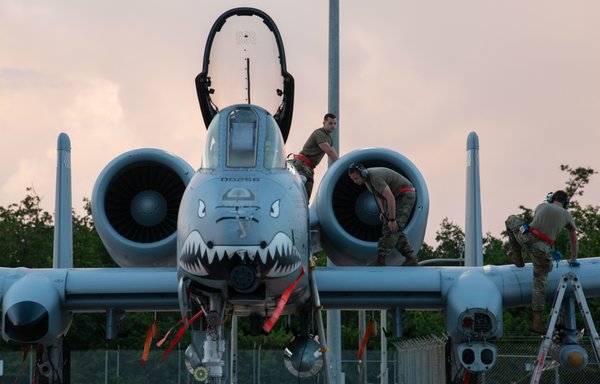 Maintainers perform a post-flight inspection on an A-10 Thunderbolt II at Muniz Air National Guard Base, Puerto Rico, February 16. [US Air Force]