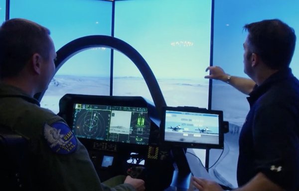 A pilot in training with an F-35 simulator at Ramstein Air Base in Germany. [US Air Force]