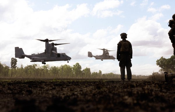 A US Marine Corps officer watches an Osprey aircraft land on July 6 during a training exercise.[US Marine Corps]